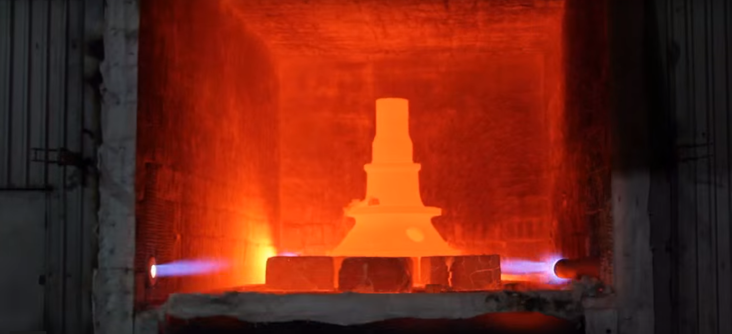 Steel part being heated in high temperature industrial furnace
